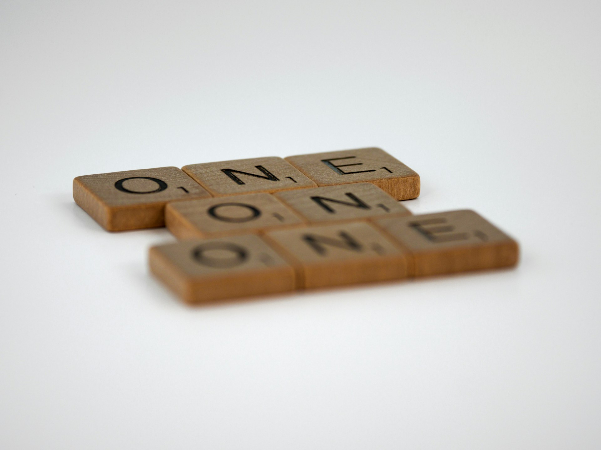 brown wooden letter t-letter